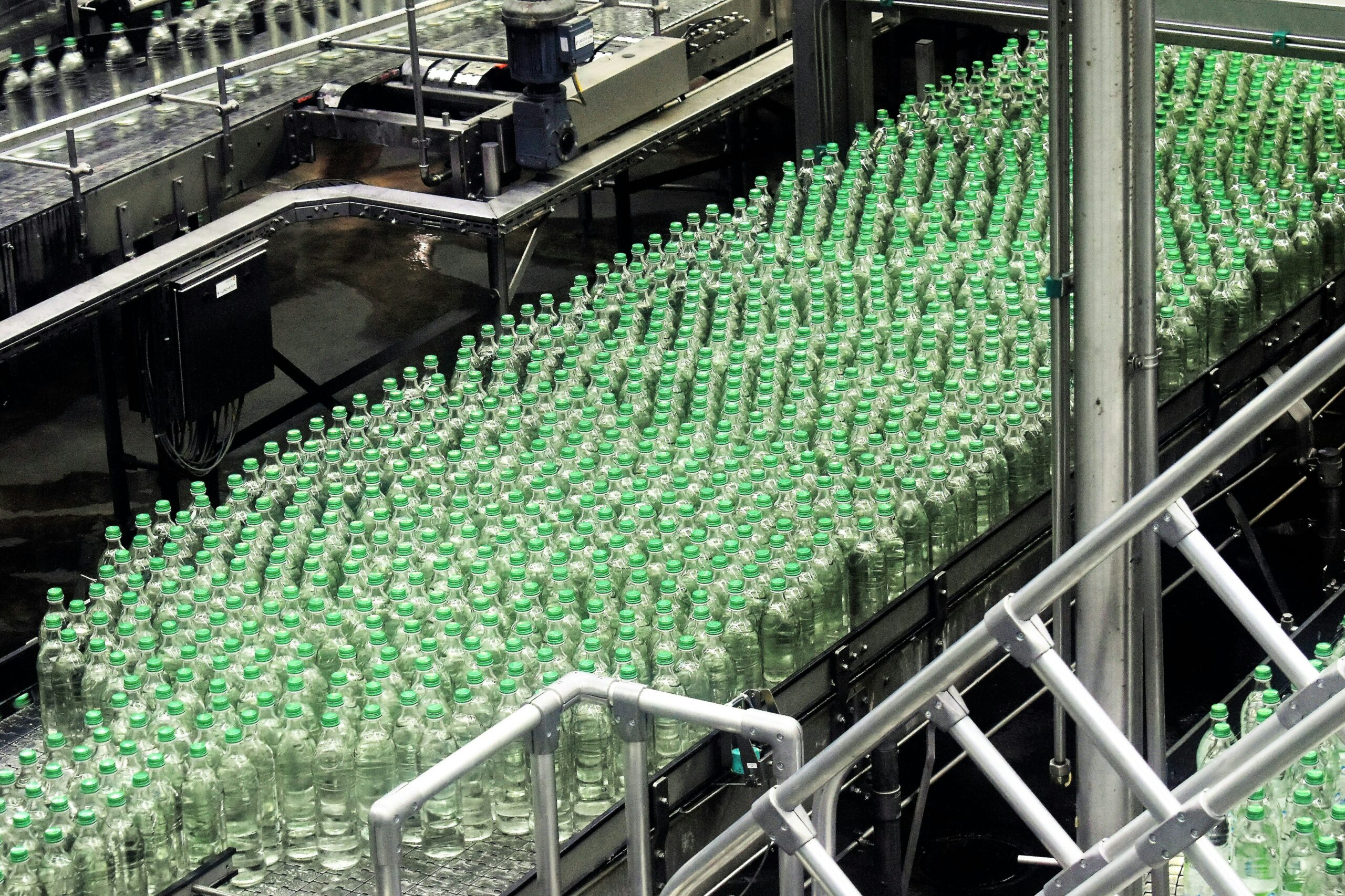 Bottled drinks on a conveyor belt.