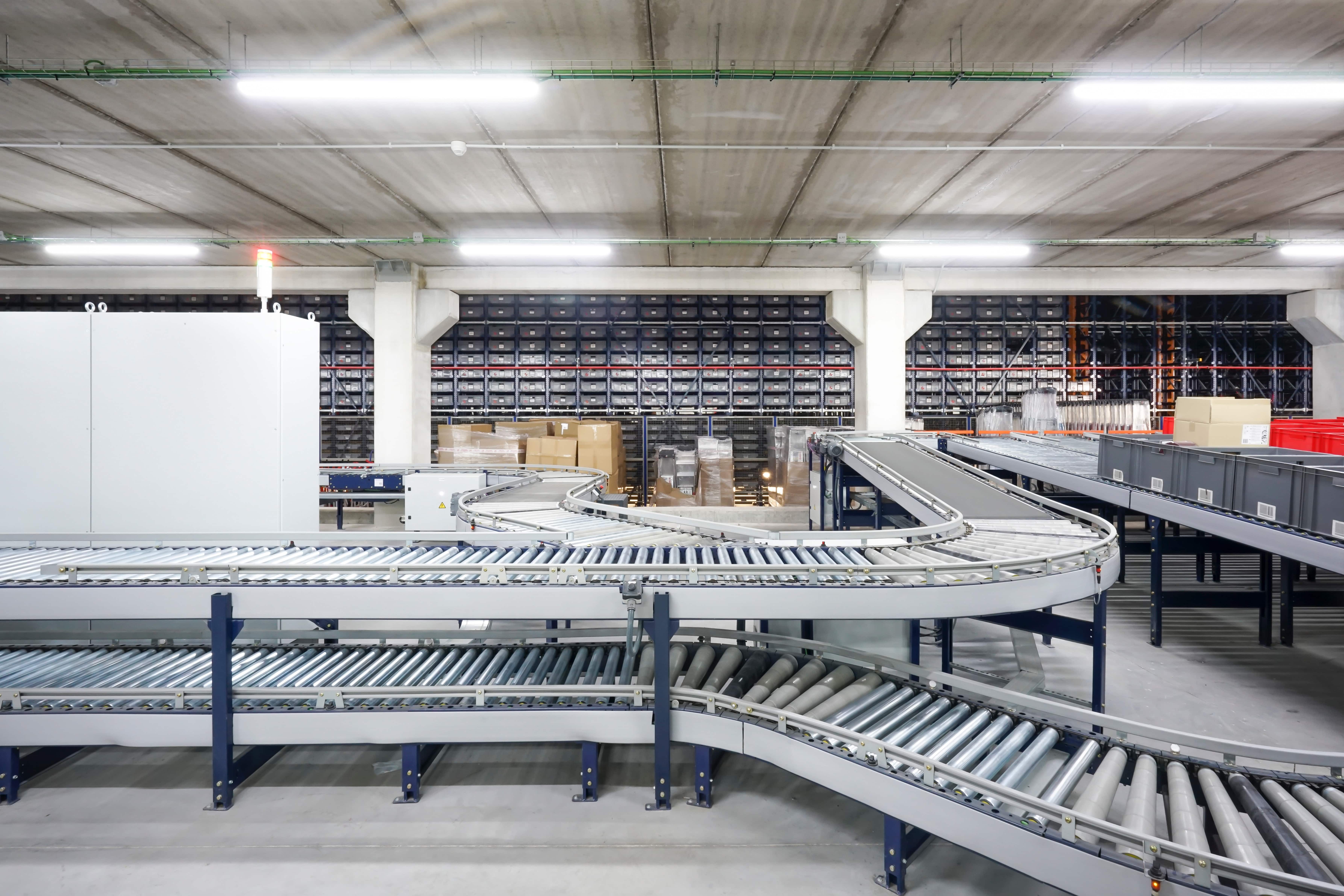 conveyor belt in a large warehouse.